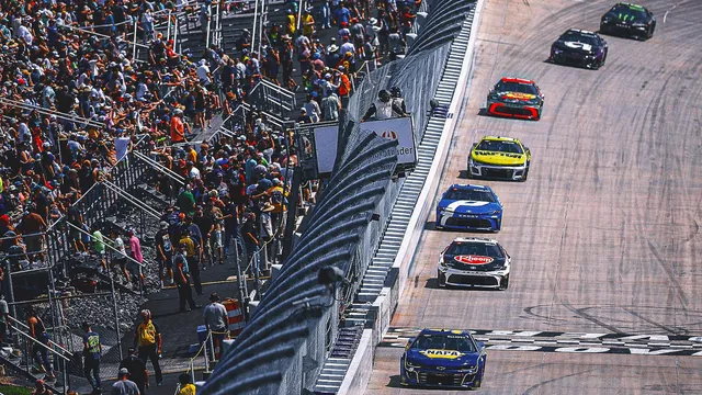 Denny Hamlin Triumphs Amid Weather Challenges to Secure Consecutive Victory at Dover